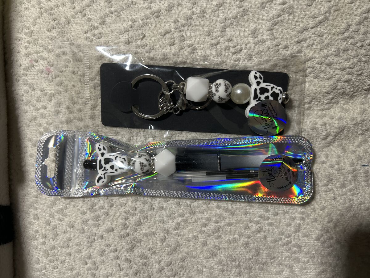 Black and white cow head set